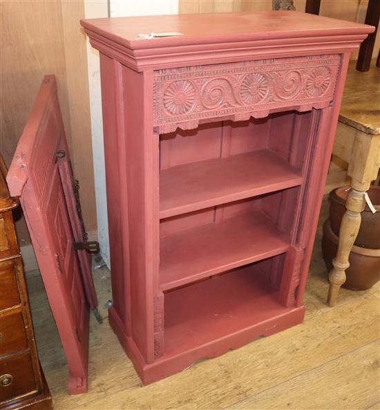 A red painted three shelf bookcase and a wall mounted two door panel (2) cabinet W.68cm